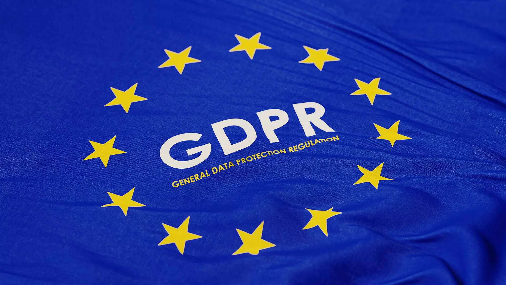 Image d'un drapeau bleu avec des étoiles jaunes rappelant celui l'Union Européen, avec écrit au centre le sigle de RGPD et sa signification juste en dessous.